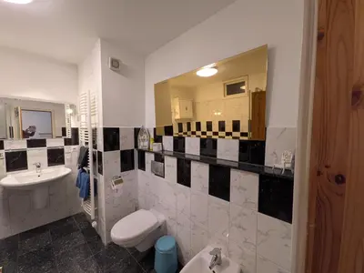 Ein Badezimmer in der Unterkunft Doppelhaushälfte Scheunenzauber