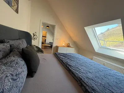 Ein Bett oder Betten in einem Zimmer der Unterkunft Mosel-Auszeit