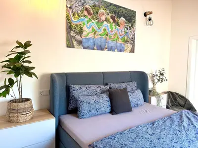 Ein Bett oder Betten in einem Zimmer der Unterkunft Mosel-Auszeit