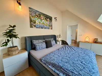 Ein Bett oder Betten in einem Zimmer der Unterkunft Mosel-Auszeit