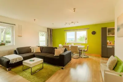 Ein Sitzbereich in der Unterkunft Dolomites Bungalow Eifelsteig w view Terrace BBQ
