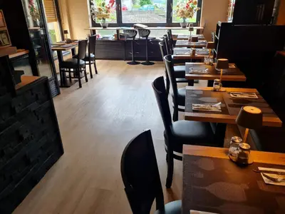 Ein Restaurant oder anderes Speiselokal in der Unterkunft Gasthaus Paula