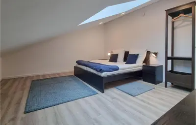 Ein Bett oder Betten in einem Zimmer der Unterkunft Gorgeous Apartment In Trier With Wifi