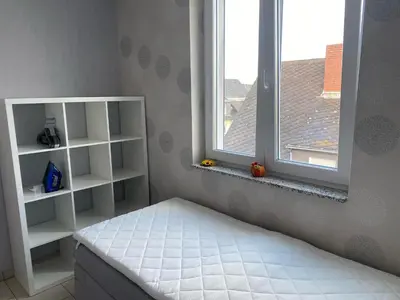 Ein Bett oder Betten in einem Zimmer der Unterkunft Mani´s Feriendomizil