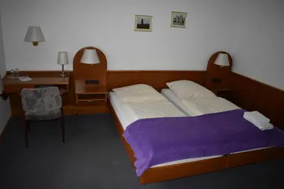 Ein Bett oder Betten in einem Zimmer der Unterkunft Hotel-Restaurant Theis-Muehle