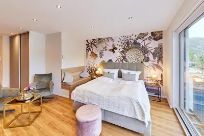 Ein Bett oder Betten in einem Zimmer der Unterkunft Luxus Apartments Mosel-Zeit NEU 2023