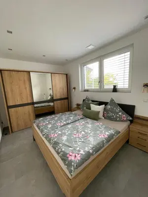 Ein Bett oder Betten in einem Zimmer der Unterkunft Traumblick Vallendar 2.0