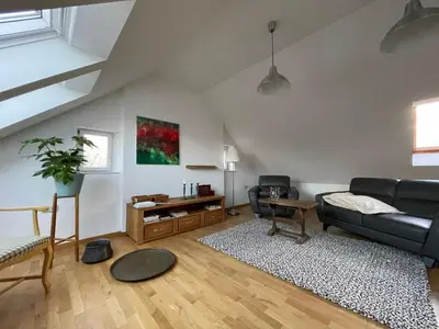 Ein Sitzbereich in der Unterkunft Gartenhaus - a68978