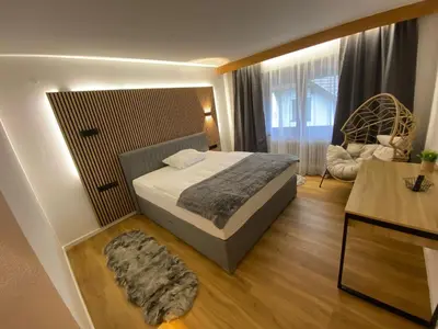 Ein Bett oder Betten in einem Zimmer der Unterkunft Naturhotel Blaubach