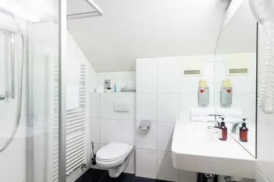 Ein Badezimmer in der Unterkunft Naturhotel Blaubach