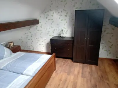 Ein Bett oder Betten in einem Zimmer der Unterkunft Taubenschlag