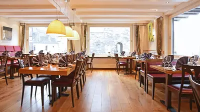 Ein Restaurant oder anderes Speiselokal in der Unterkunft Rhein Hotel Bacharach und Stübers Restaurant