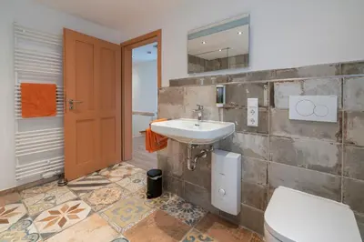 Ein Badezimmer in der Unterkunft Franze´s Haus - mit Rhein- & Burgenblick