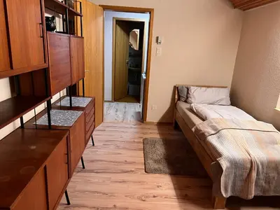 Ein Bett oder Betten in einem Zimmer der Unterkunft Monteur- und Gästehaus am Brückchen mit All Inklusive Nutzung