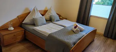 Ein Bett oder Betten in einem Zimmer der Unterkunft Ferienhaus Hexenhäuschen