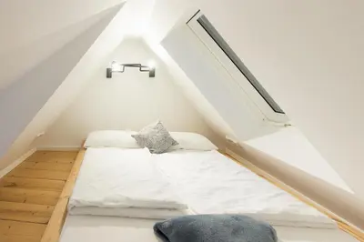 Ein Bett oder Betten in einem Zimmer der Unterkunft Romantisches Studio 4 Rosenburgblick in Moselnähe