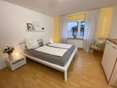 Ein Bett oder Betten in einem Zimmer der Unterkunft Ferienwohnung Vater Rhein Mittelrheintal