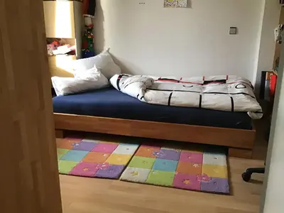 Ein Bett oder Betten in einem Zimmer der Unterkunft Doppelzimmer mit Terrasse zum Garten, ruhig, Weinbergsblick, zusätzliches Kinderzimmer anbei möglich
