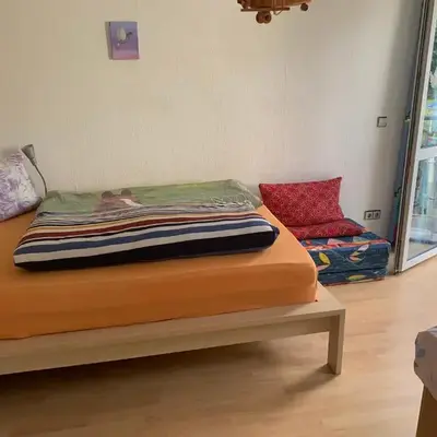 Doppelzimmer mit Terrasse zum Garten