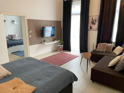 Ein Bett oder Betten in einem Zimmer der Unterkunft Schönes Apartment Mitten in der Stadt III
