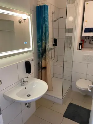 Ein Badezimmer in der Unterkunft Schönes Apartment Mitten in der Stadt III