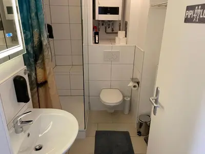 Ein Badezimmer in der Unterkunft Schönes Apartment Mitten in der Stadt III
