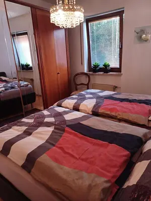 Ein Bett oder Betten in einem Zimmer der Unterkunft Ferienwohnung Fischer