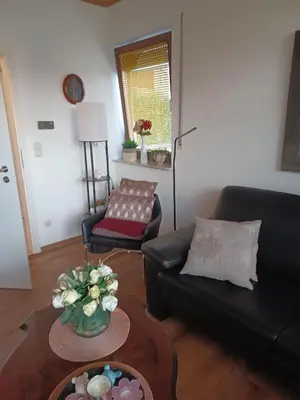 Ein Sitzbereich in der Unterkunft Ferienwohnung Fischer