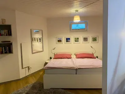 Ein Bett oder Betten in einem Zimmer der Unterkunft Ferienappartement Greiff