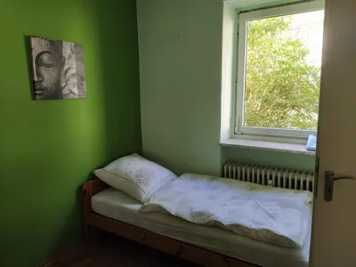 Ein Bett oder Betten in einem Zimmer der Unterkunft Schöne Ferienwohnung in Becheln