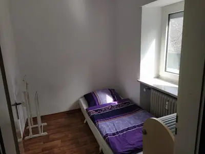 Ein Bett oder Betten in einem Zimmer der Unterkunft Schöne Ferienwohnung in Becheln