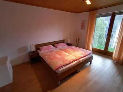 Ein Bett oder Betten in einem Zimmer der Unterkunft Adenauer Cottage