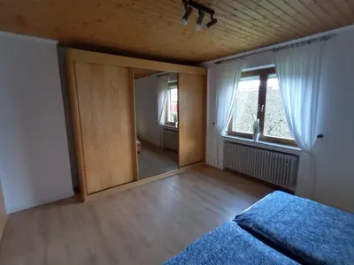 Ein Bett oder Betten in einem Zimmer der Unterkunft Adenauer Cottage