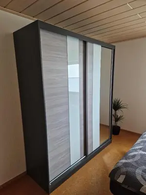 Ein Bett oder Betten in einem Zimmer der Unterkunft Ferienwohnung Moselzeit
