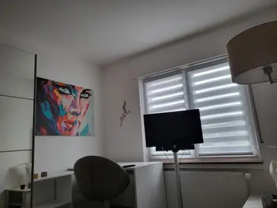 TV/Unterhaltungsangebot in der Unterkunft Lounge 3 mit 2 Schlafzimmern