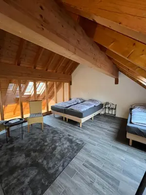 Ein Bett oder Betten in einem Zimmer der Unterkunft Ferienwohnung am Wald-und Wiesenkorb