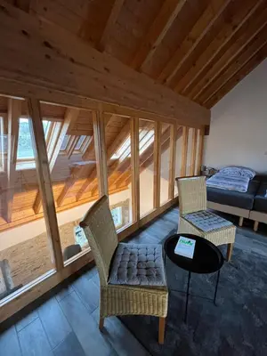 Ein Sitzbereich in der Unterkunft Ferienwohnung am Wald-und Wiesenkorb