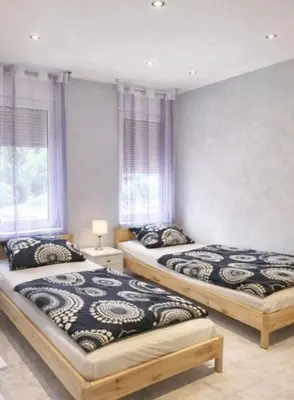 Ein Bett oder Betten in einem Zimmer der Unterkunft Ferienwohnungen am Holzmarkt, am Rande der Altstadt