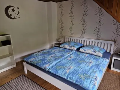 Ein Bett oder Betten in einem Zimmer der Unterkunft Ferienhaus Heimes