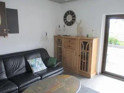 Ein Sitzbereich in der Unterkunft Ferienwohnung Mittendrin, Stadtmitte Hermeskeil