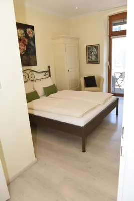 Ein Bett oder Betten in einem Zimmer der Unterkunft Altes Weingut an der Vogtei