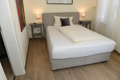Ein Bett oder Betten in einem Zimmer der Unterkunft Altes Weingut an der Vogtei