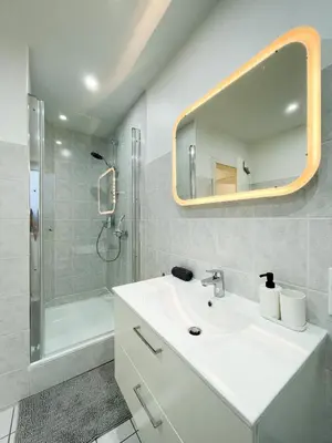 Ein Badezimmer in der Unterkunft Ferienwohnung Schönes Maifeld