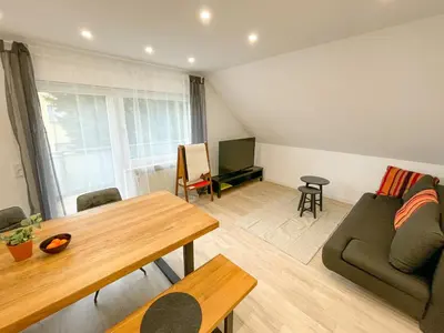 Ein Sitzbereich in der Unterkunft Ferienwohnung Schönes Maifeld