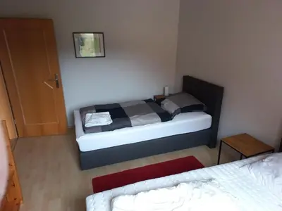 Ein Bett oder Betten in einem Zimmer der Unterkunft Ferien im Winzerhaus