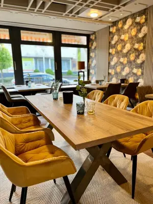 Ein Sitzbereich in der Unterkunft JUNIPRO Hotel Schinderhannes