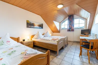 Ein Bett oder Betten in einem Zimmer der Unterkunft Ferienwohnung Linda