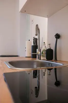 Küche/Küchenzeile in der Unterkunft Stadtoase Design Wohnung in der Altstadt von Koblenz