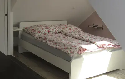 Ein Bett oder Betten in einem Zimmer der Unterkunft Appartements Im Sonnenberg
