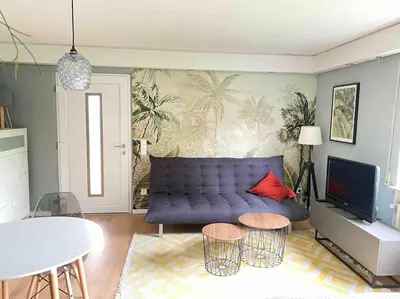 Ein Sitzbereich in der Unterkunft Mitten in Nastätten und doch im Grünen: schönes und modernes Apartment